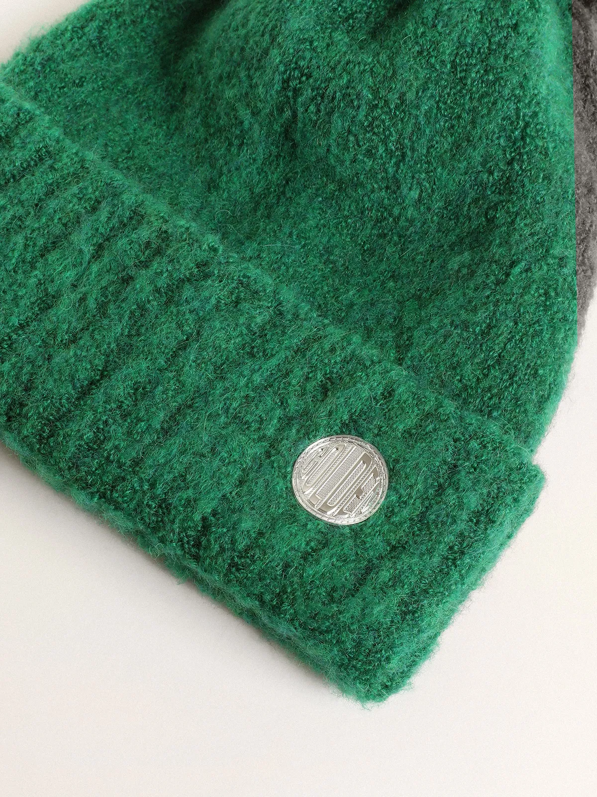 Journey Collection green wool beanie with pompom